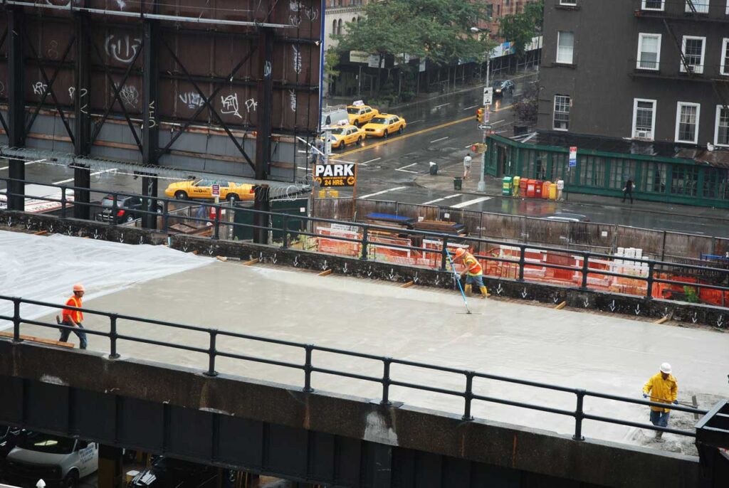 Preparing the "concrete bathtub" for the lawn, August 2009. Photo: Annik LaFarge, author of On the High Line
